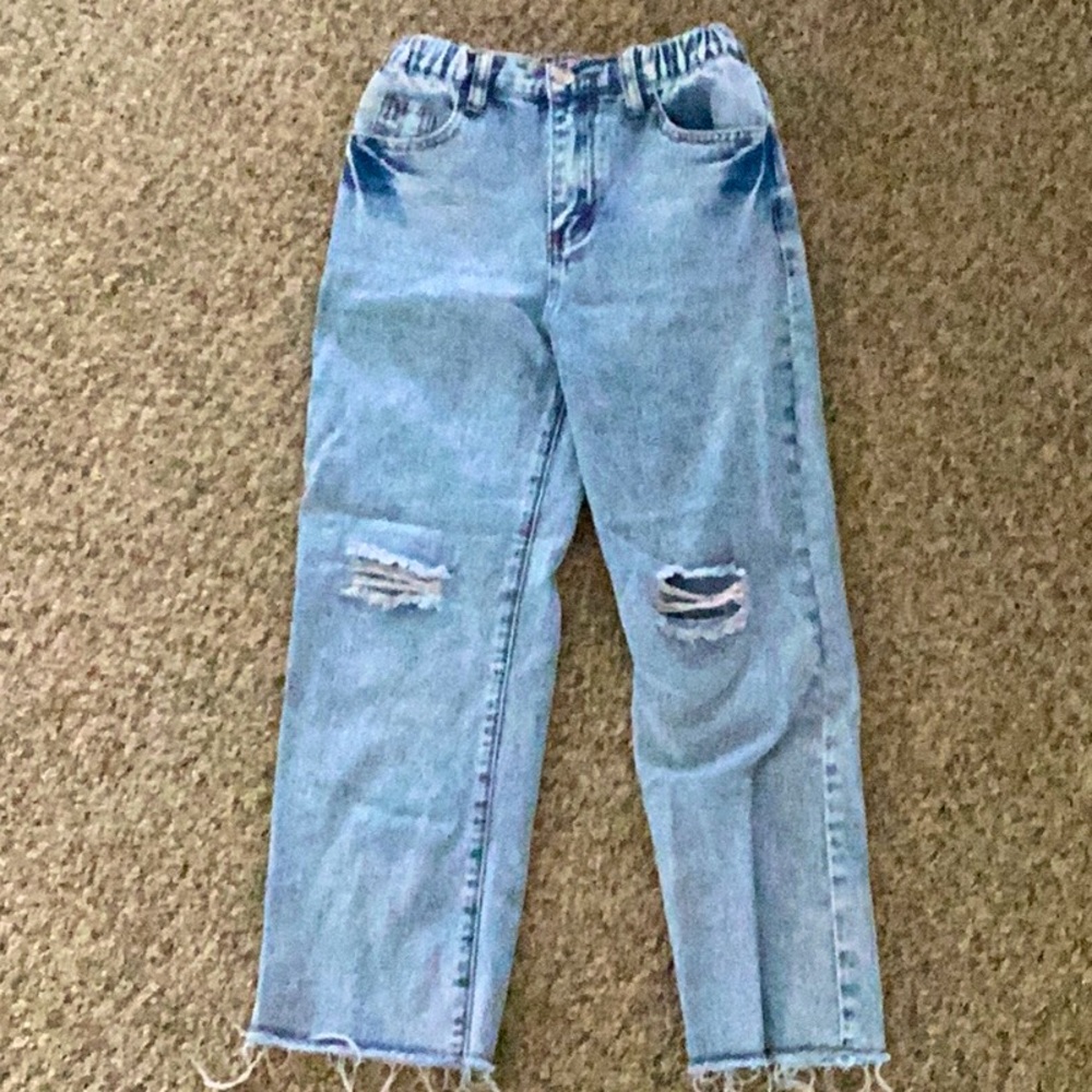 Generic 11 year old girl blue ripped jeans